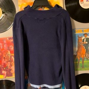 Navy blue/baby blue zip half placket shirt.